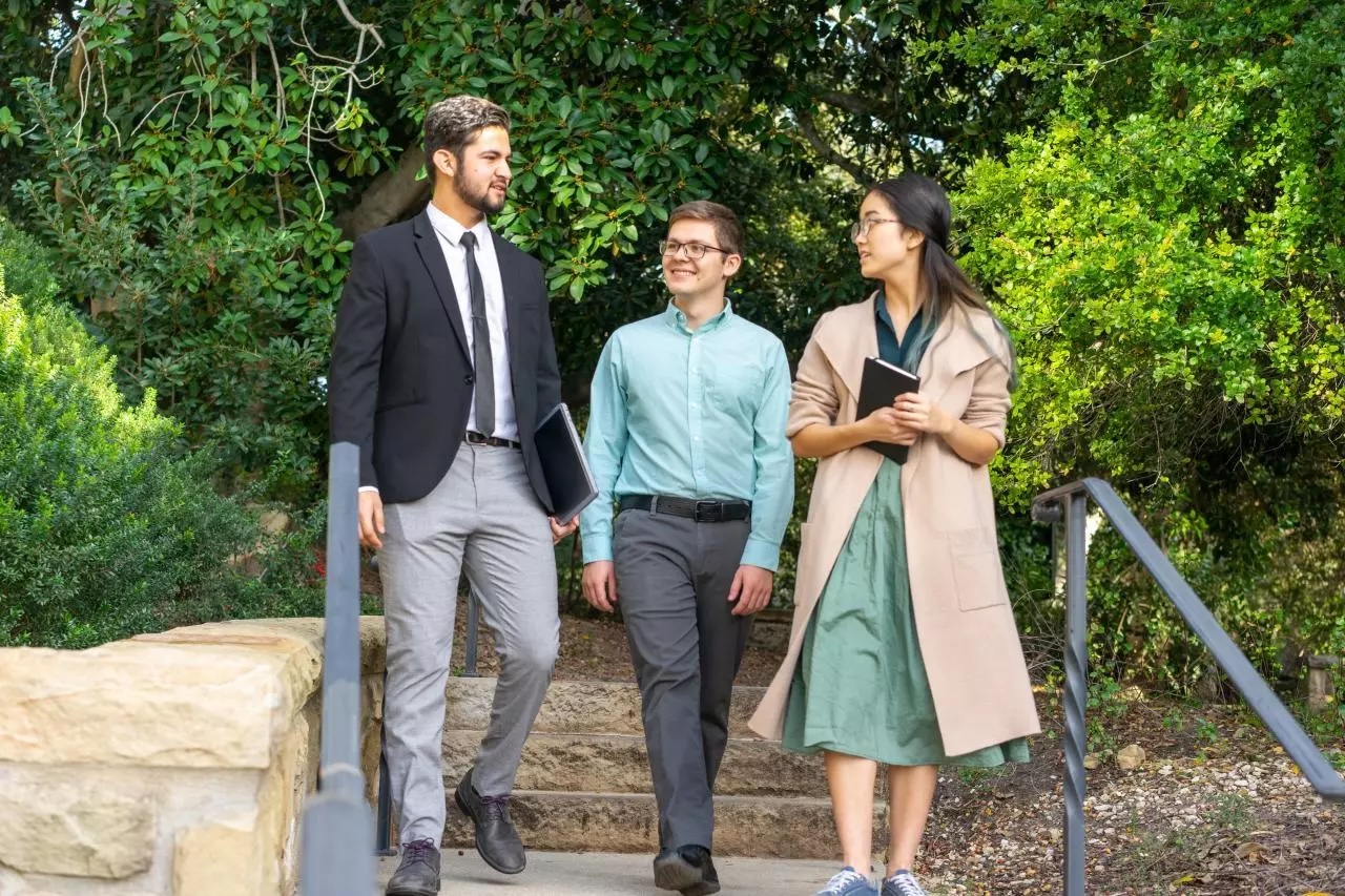 staff walking on campus