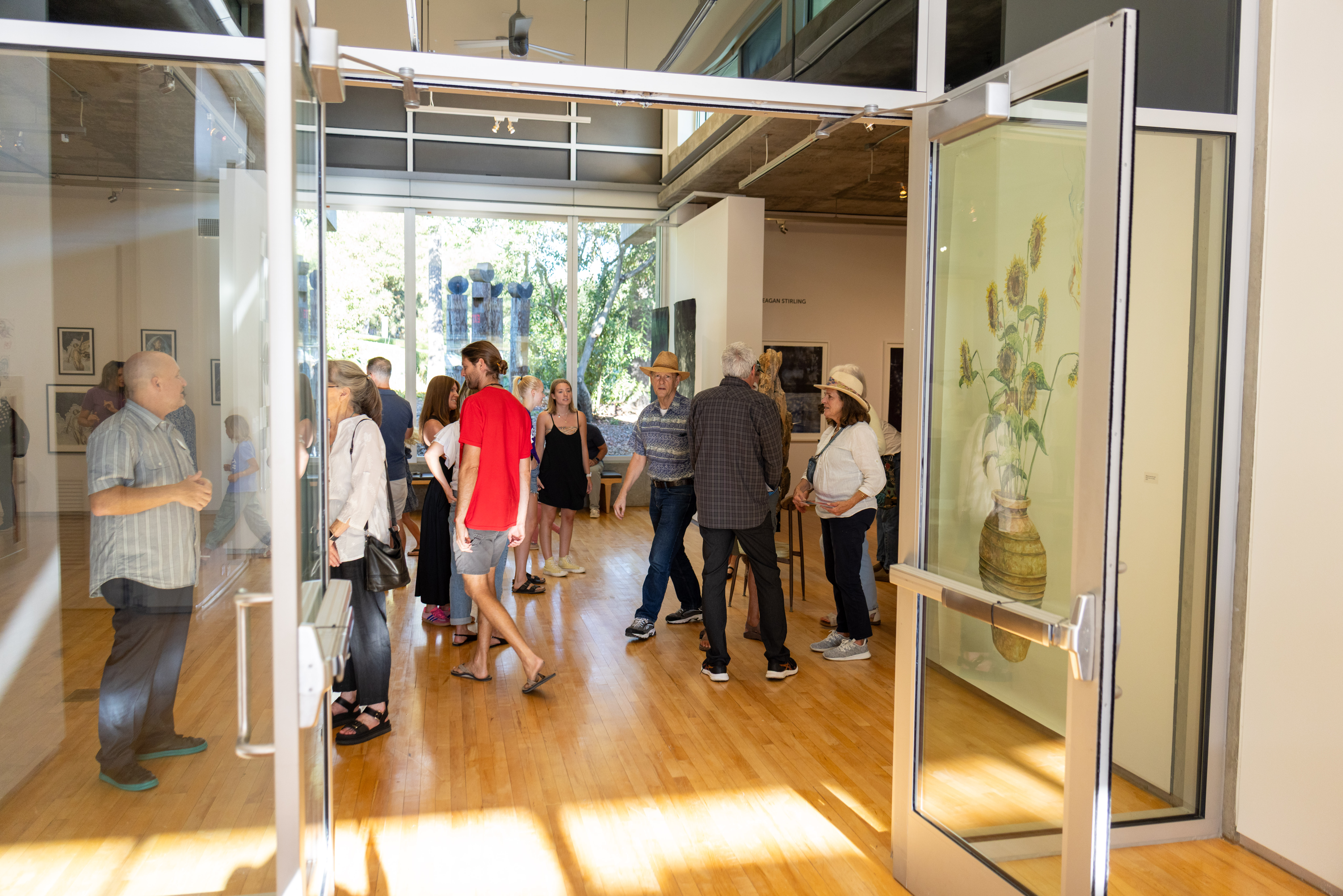 Visitors enjoying Lines of Inquiry reception.