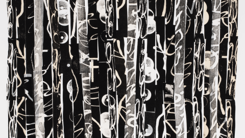 Black and white strips of paper arranged in a row.