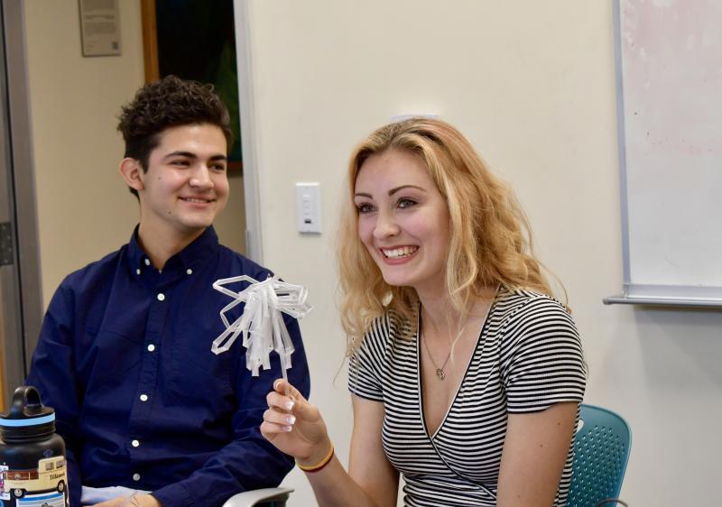 James and Kristen smiling during a training exercise